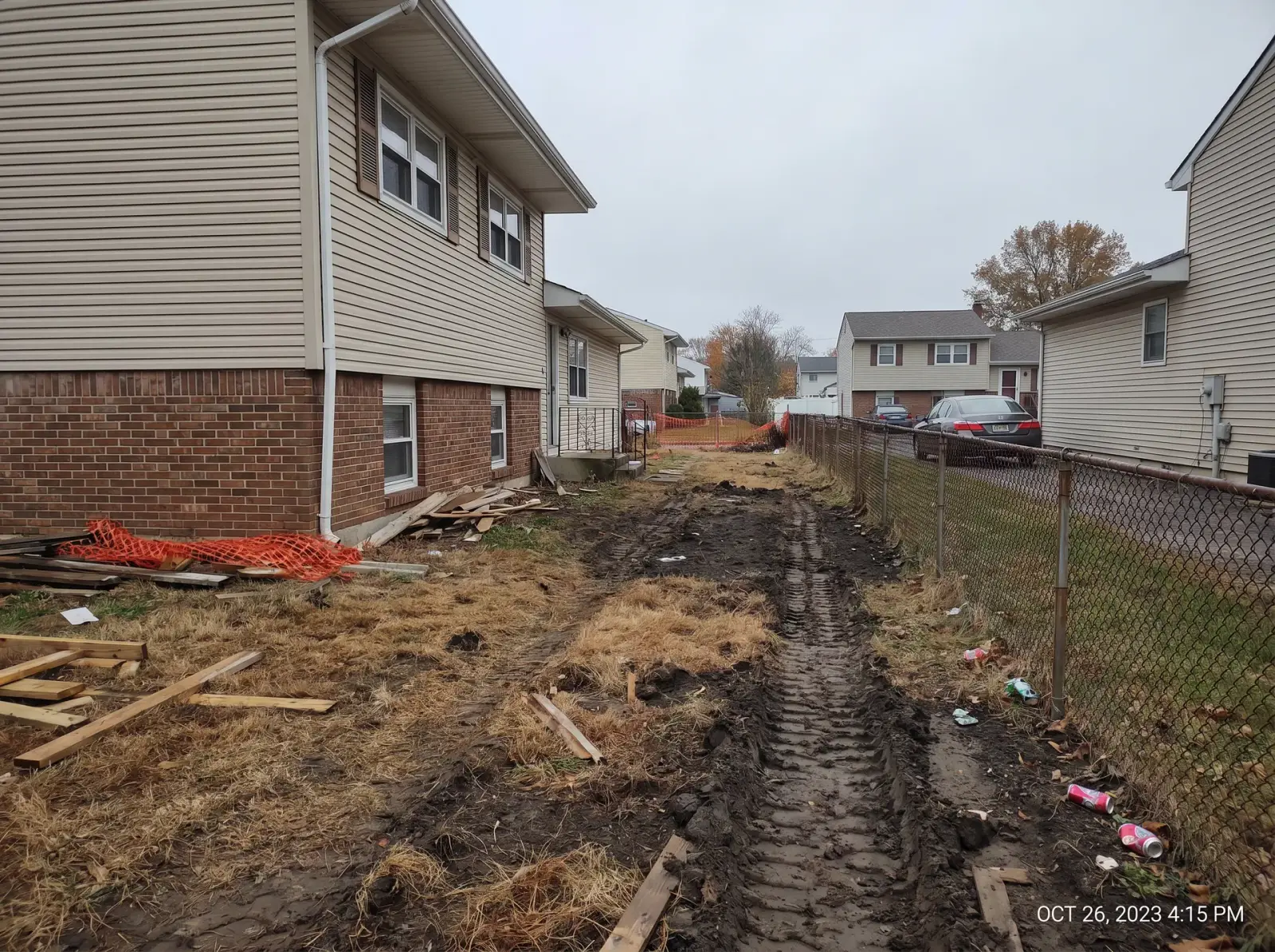 Before sod installation — split-level — side yard in Jackson, NJ